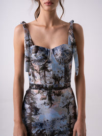 Carolina Sanz VEGA bustier top in black, fitted design with adjustable straps, shown on a mannequin.