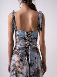 Carolina Sanz VEGA bustier top featuring a fitted design, lightweight fabric, and stylish neckline, displayed on a mannequin.