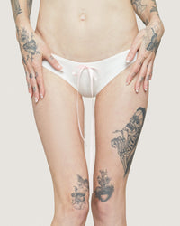 White classic princess brief lingerie by Cats n Scribbles, soft fabric, comfortable fit, with delicate lace details.