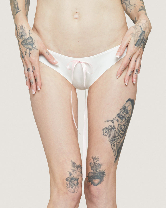 White classic princess brief lingerie by Cats n Scribbles, soft fabric, comfortable fit, with delicate lace details.