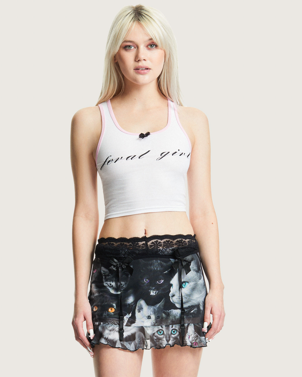White Feral Girl Baby Rib women's top by Cats n Scribbles, showcasing a close-up of the soft ribbed fabric and stylish fit.