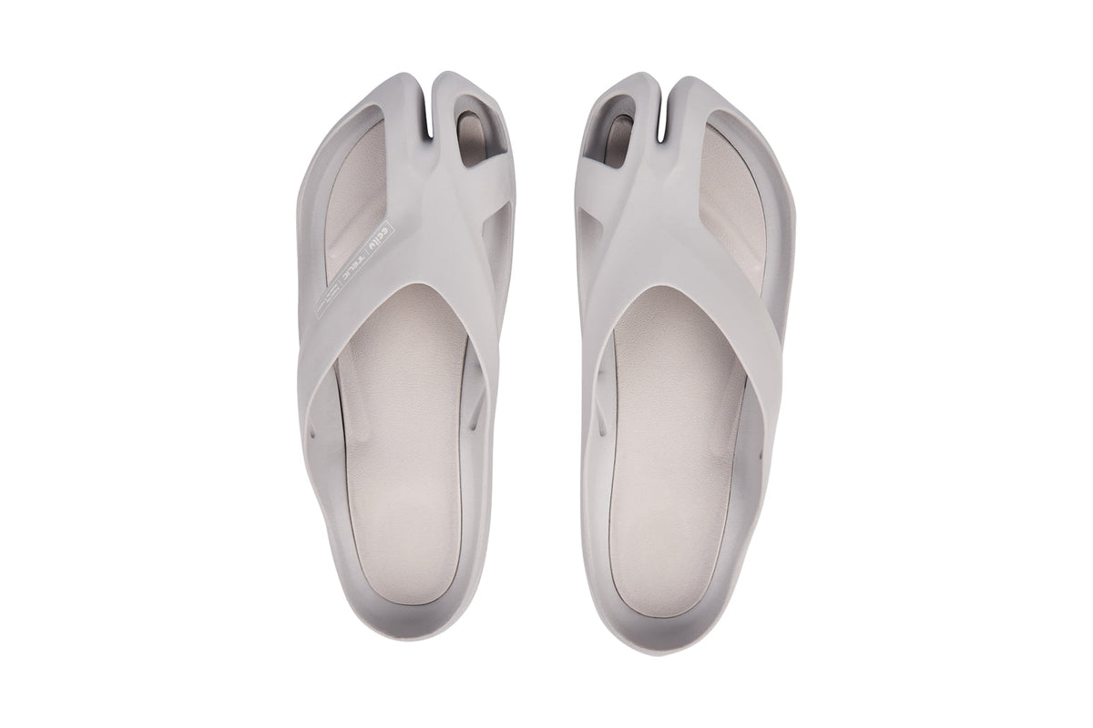 CCILU women's sandal with stepping stones caring design in platinum grey, featuring a comfortable open-toe style and slip-on fit.