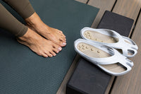 Women’s CCILU Stepping Stones Caring sandal with open toe and adjustable straps, featuring a comfortable sole and casual design.