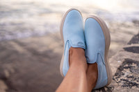 Women’s CCILU XpreSole Cody sandal with beige straps and open toe design, featuring a comfortable slip-on style.