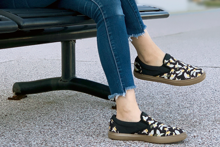 Black floral CCILU XpreSole Cody women's sandals with adjustable straps and cushioned footbed, showcasing the stylish design.