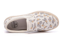 Women’s CCILU XpreSole Cody sandal with beige straps and textured sole, showcasing a casual slip-on design.