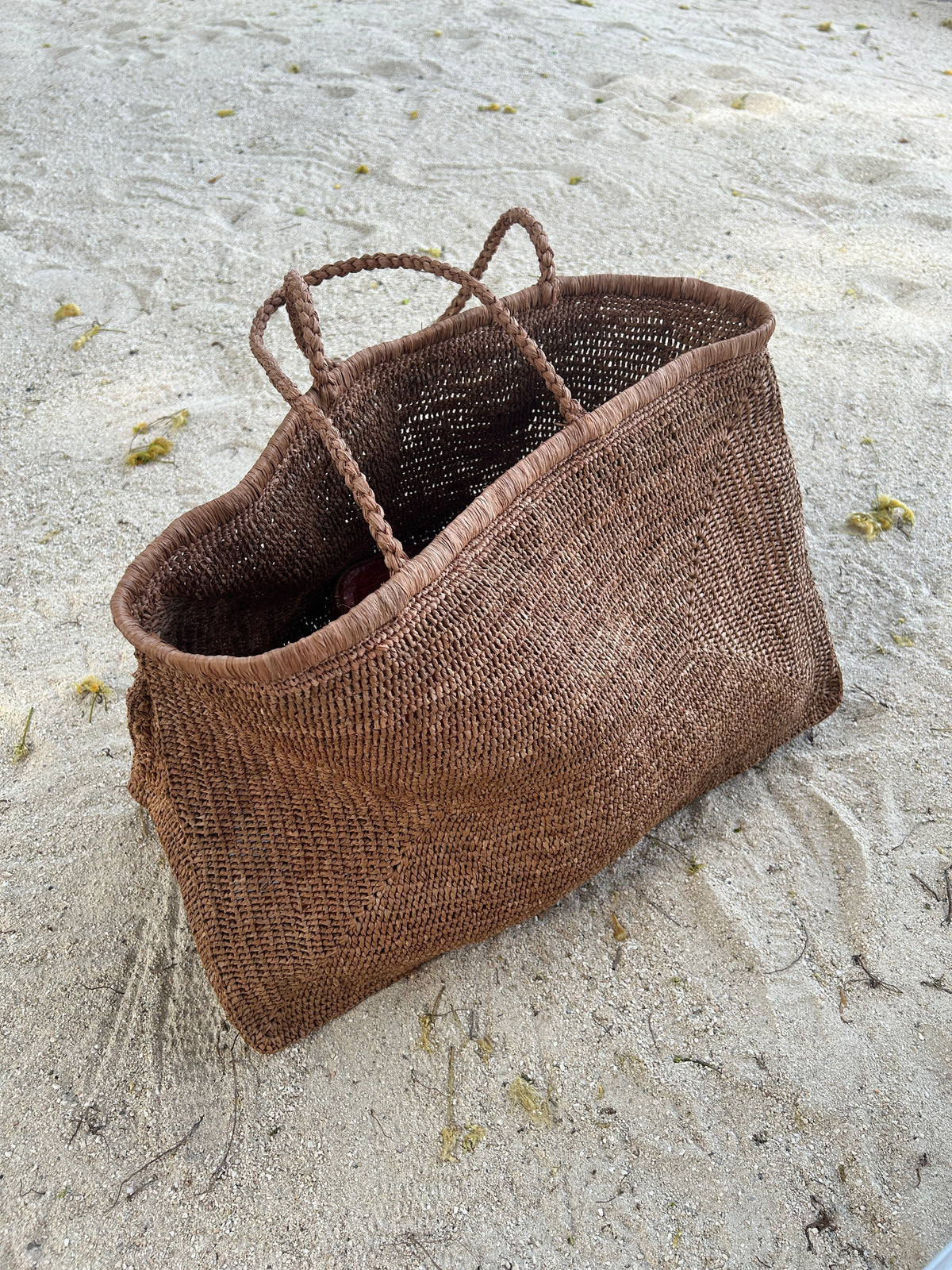 Blue Clipa XXL Raffia Beach Tote Bag by DC-Powered by People with woven raffia design and sturdy handles for beach outings.