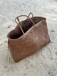 Blue Clipa XXL Raffia Beach Tote Bag by DC-Powered by People with woven raffia design and sturdy handles for beach outings.