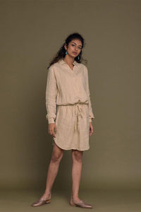 Neutral beige Cliff Dress by DC-Reistor featuring a relaxed fit, with a flowing silhouette and subtle neckline details.