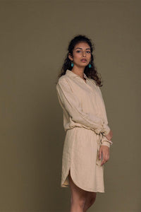 Neutral beige Cliff Dress by DC-Reistor featuring a flowy silhouette and casual style, shown on a model with a relaxed pose.