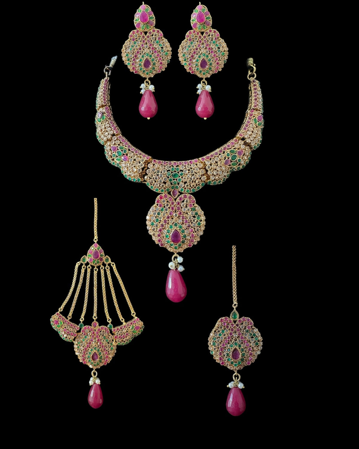 Deepa multicolor bridal CZ necklace set with jhoomar tika by Deccan Jewelry, featuring intricate design and vibrant stones.