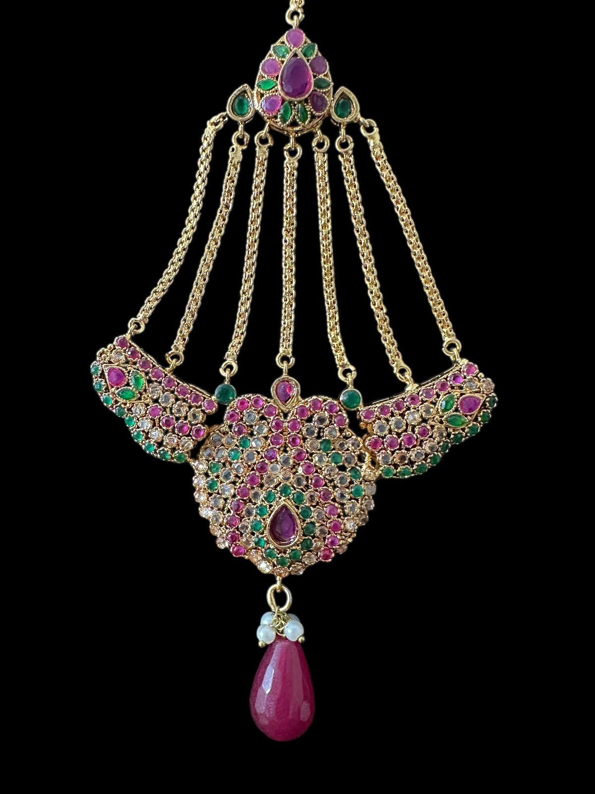 Deepa multicolor bridal CZ necklace set with jhoomar tika from Deccan Jewelry, featuring intricate design and vibrant stones.