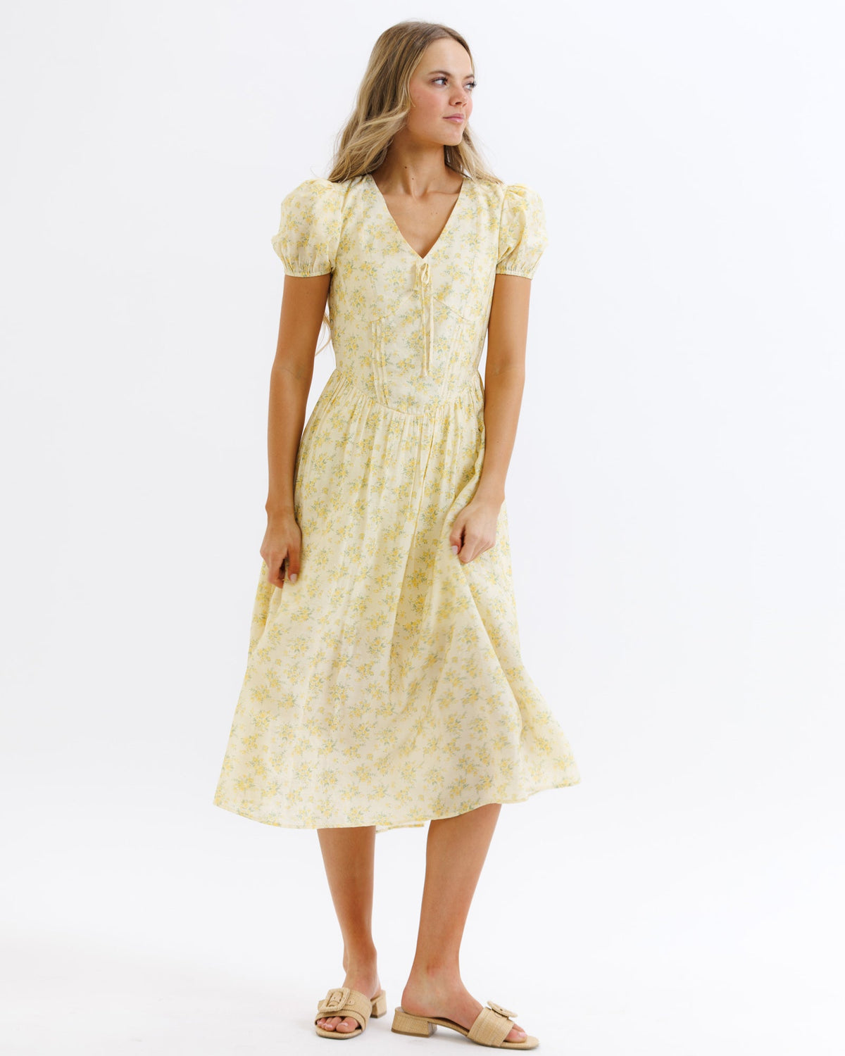 Downeast Sunshine State of Mind Dress in butter yellow with colorful sun and floral print, sleeveless summer dress.