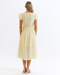 Downeast Sunshine State of Mind Dress in butter yellow with colorful floral print, lightweight and casual for warm weather.