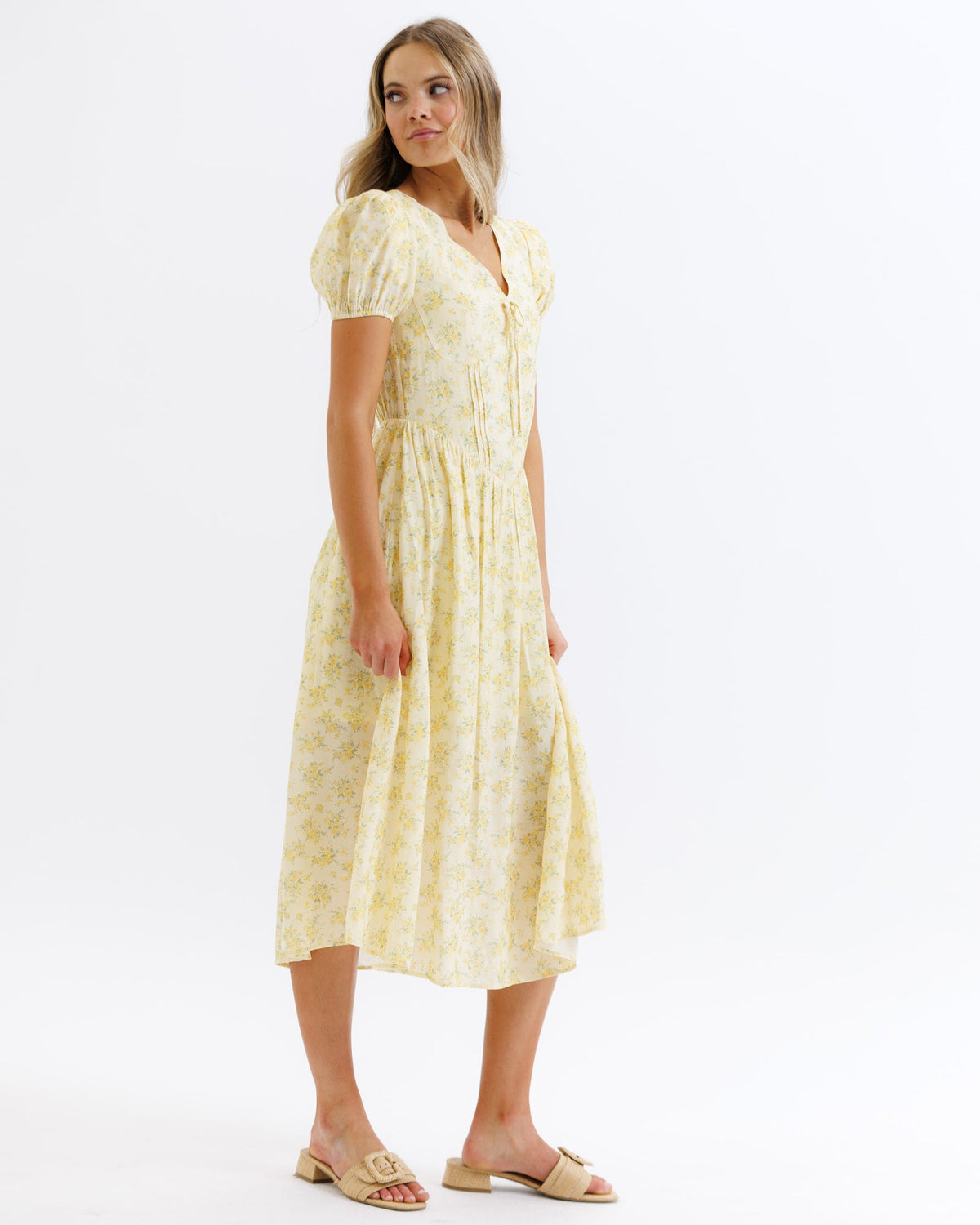 Downeast Sunshine State of Mind Dress in butter yellow with colorful sun and floral print, lightweight and casual for warm weather.