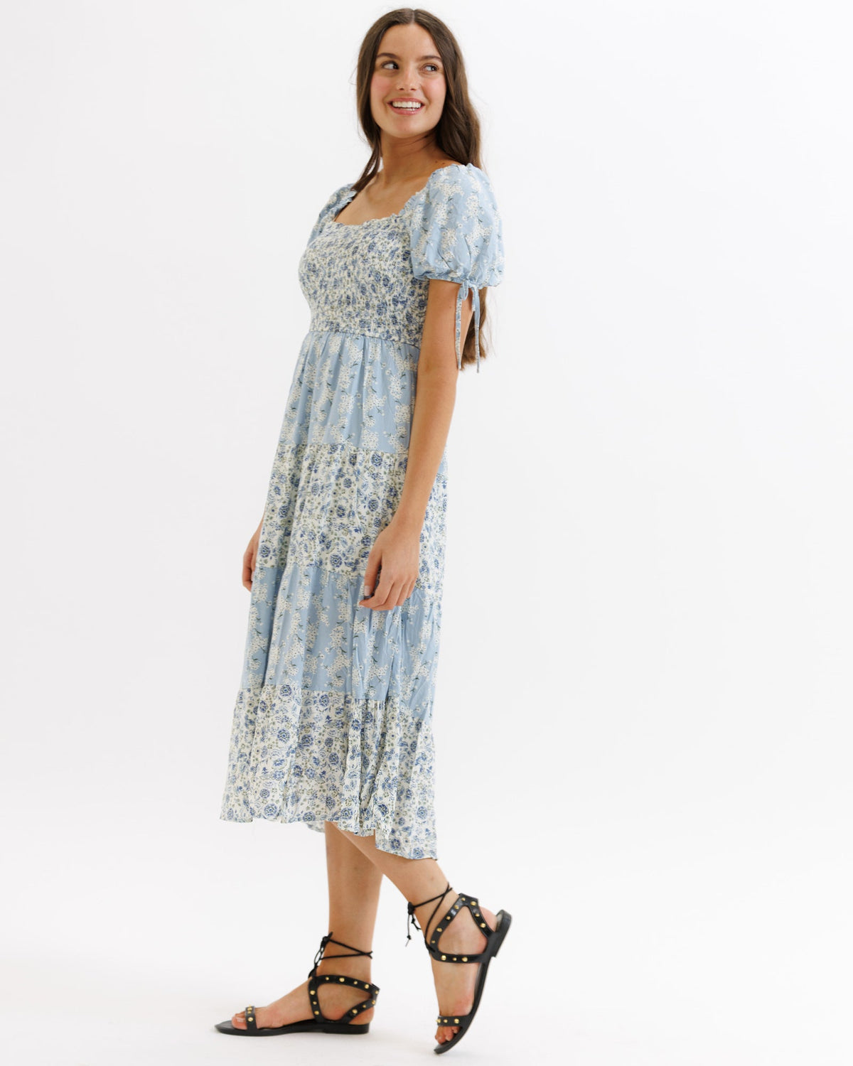 Light blue multi-pattern Fresh Bouquet dress by Downeast featuring a flowy, lightweight fabric and floral design.