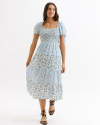 Light blue multi Fresh Bouquet Dress by Downeast, flowing dress with floral print, perfect for casual or summer wear.
