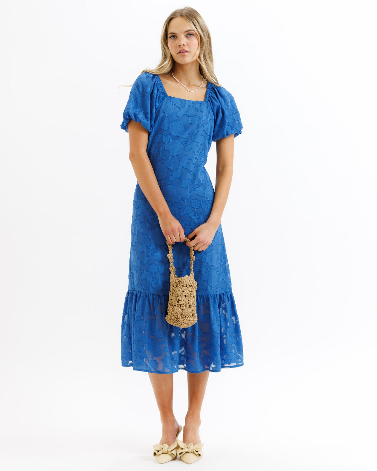 Bright cobalt Downeast Perennial Dress for women, lightweight with a feminine fit, shown on a model.