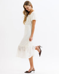 Bright cobalt Downeast Perennial Dress, lightweight and flowy, with a sleeveless design and subtle floral pattern.