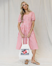 Bright red stripe Must Have Mitered Dress by Downeast, sleeveless with a fitted silhouette and mitered hem detail.