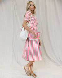 Bright red striped must-have mitered dress by Downeast, sleeveless with a fitted silhouette and stylish design.