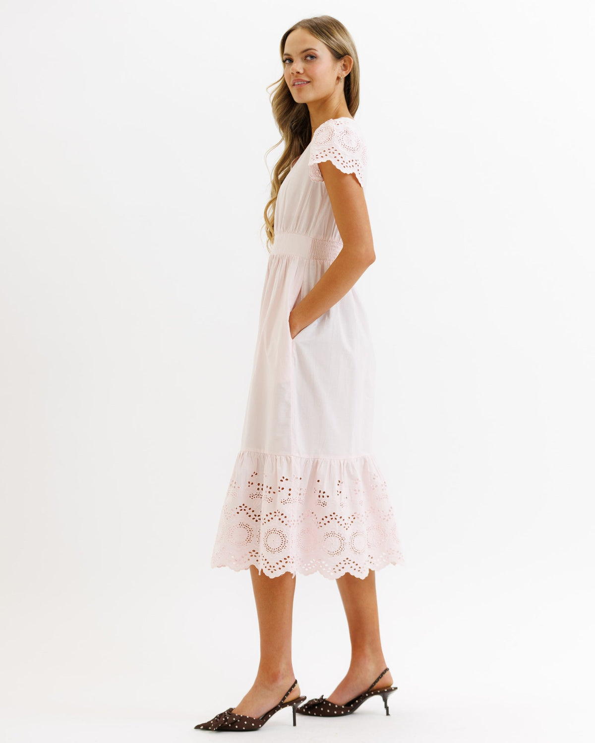 Downeast Eiffel Eyelet Dress in XS with delicate eyelet fabric, sleeveless design, perfect for casual or summer occasions.