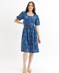 Downeast Obsessed Dress in floral denim, XS size, featuring a casual fit with a vibrant floral pattern and denim fabric.