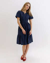 Downeast Icon Demi Dress in light fabric, featuring a fitted bodice and flowing skirt, perfect for casual or dressy occasions.