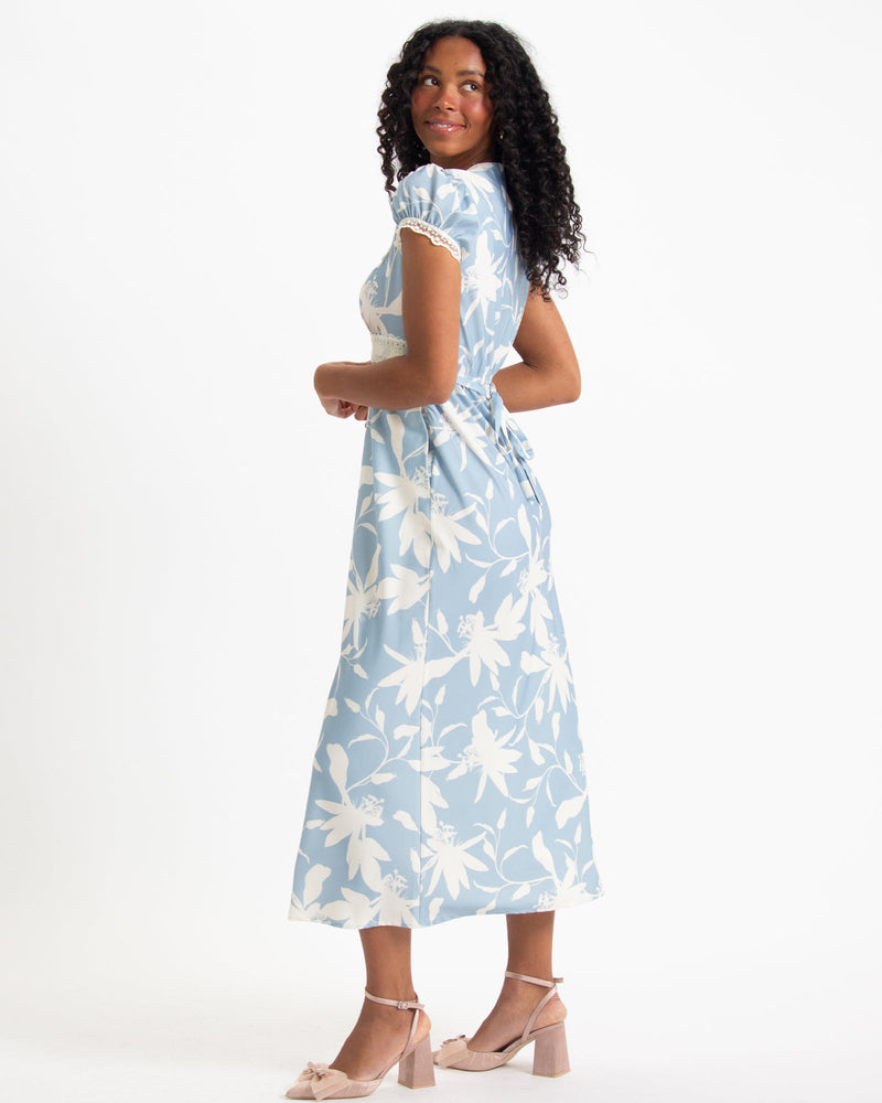 Downeast In Bloom dress featuring floral pattern, sleeveless design, and lightweight fabric in a vibrant, summery style.