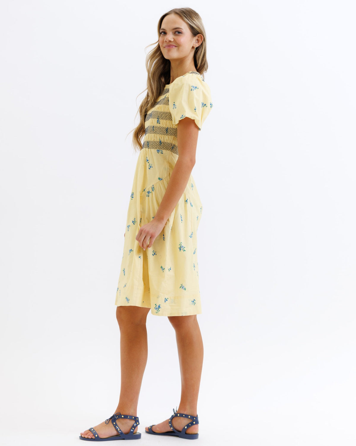 Downeast Best Buds Dress displayed on a hanger, featuring a floral print and lightweight fabric perfect for casual wear.