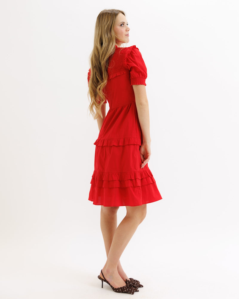 Downeast Be Mine Dress in true red, sleeveless style with a fitted bodice and flared skirt, perfect for casual or semi-formal occasions.