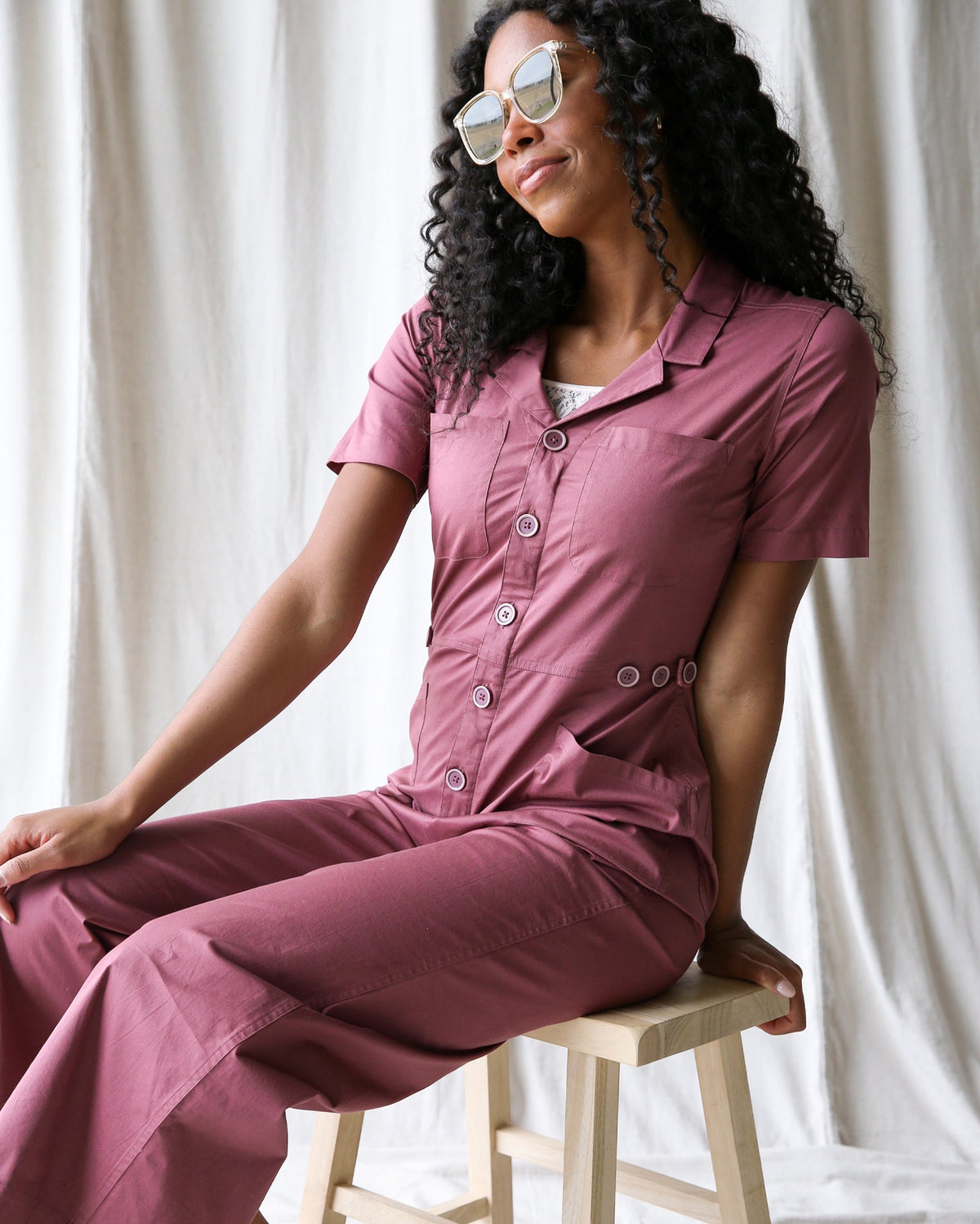 Downeast crushed berry utility jumpsuit in XS size, featuring a stylish, comfortable design with functional pockets and relaxed fit.