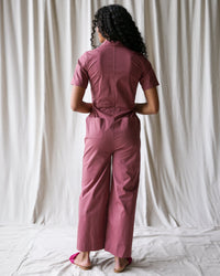 Downeast crushed berry utility jumpsuit for women, featuring a relaxed fit and functional design, shown in XS size.