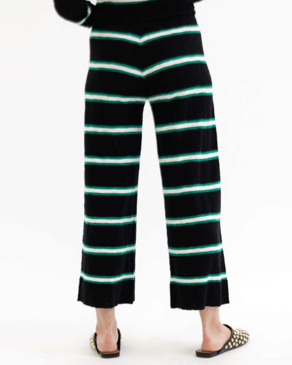 Black Downeast Round Trip Pant made of pop stripe fabric, shown in XS size, with a relaxed fit and stylish design.