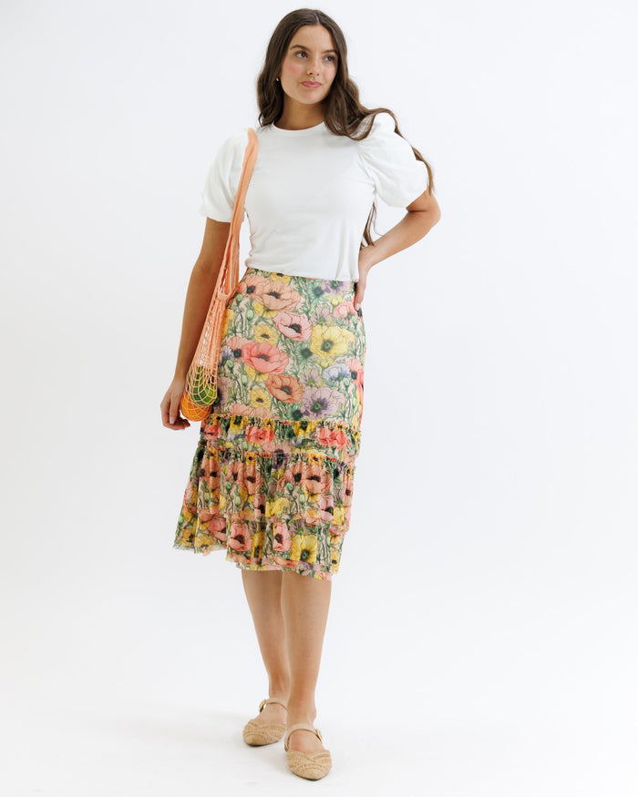 Downeast Femme & Floral skirt with a colorful floral pattern, lightweight fabric, and a flowing, feminine design.