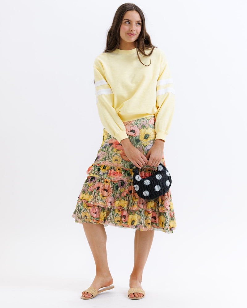 Downeast femme floral skirt with a flowy design, featuring a vibrant floral pattern and lightweight fabric.