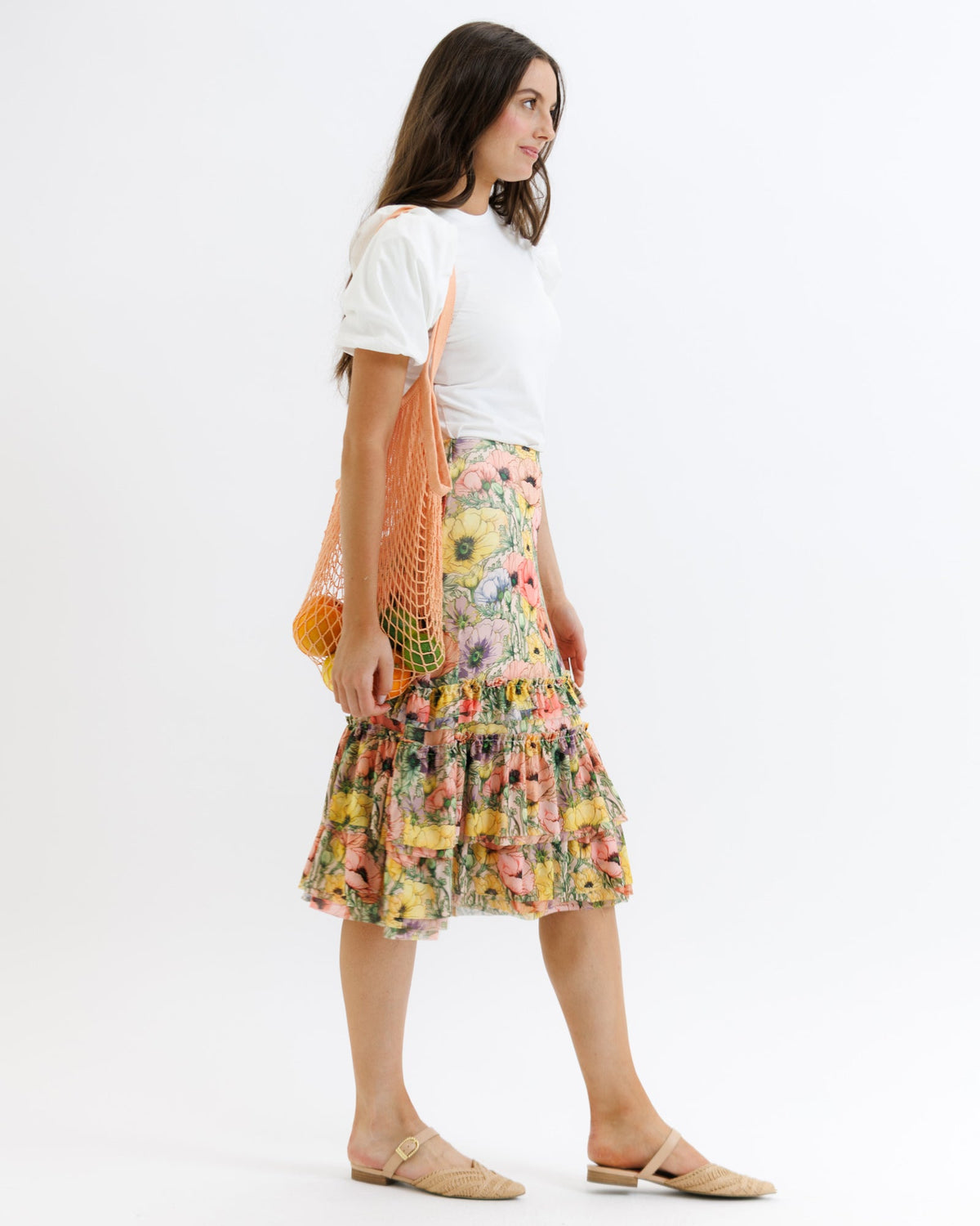 Downeast Femme & Floral skirt featuring a colorful floral pattern and lightweight fabric, perfect for casual or summer wear.