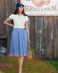 Navy check bubble skirt by Downeast, shown in XS size, featuring a playful, voluminous design and classic pattern.