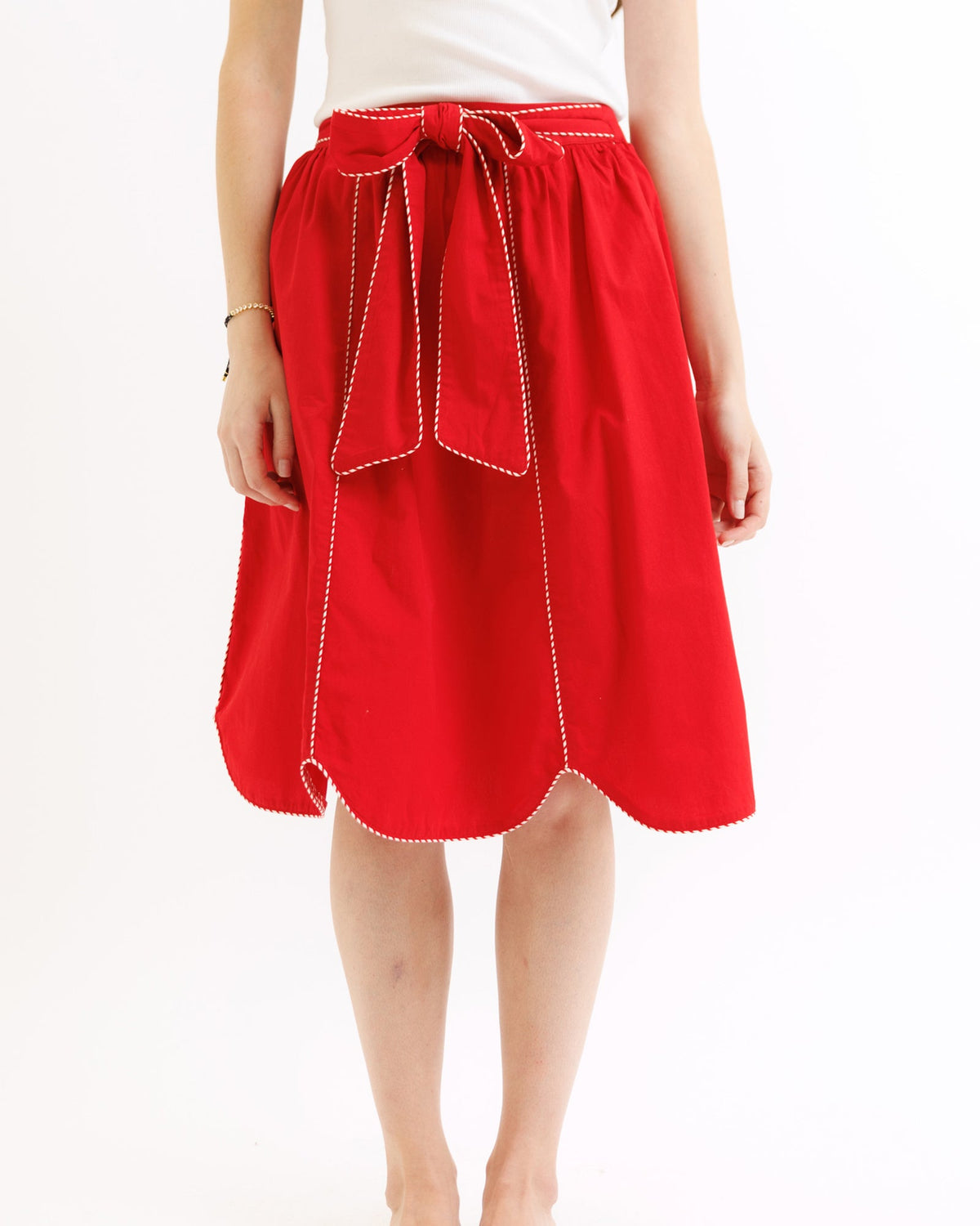 Downeast Madrid skirt with floral pattern, lightweight fabric, and knee-length design, showcased on a mannequin.