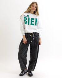Bright white Downeast The Extra Crew sweater, lightweight knit, crew neck, and long sleeves, styled on a mannequin.