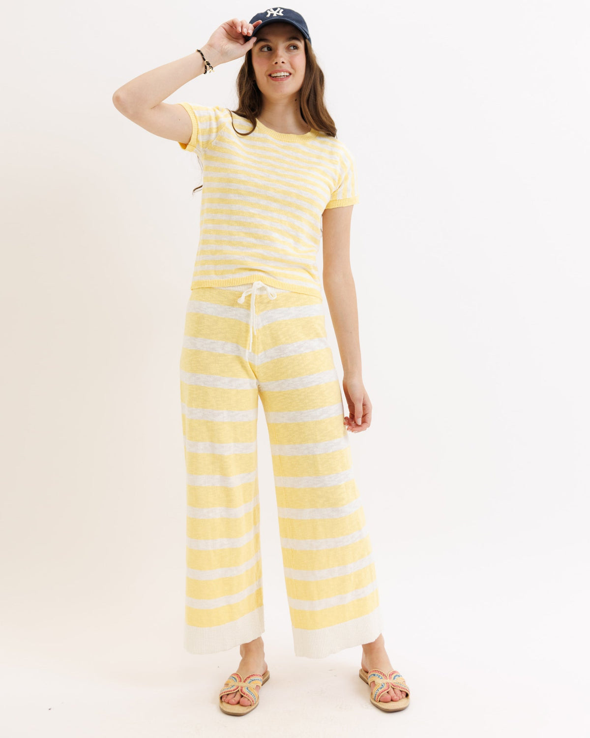 Yellow striped Downeast Round Trip Crew sweater, cozy crewneck design, stylish knit sweater for casual wear.