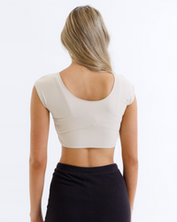 Black Downeast Contour Demi Tee displayed on a model, showcasing its relaxed fit and soft fabric for casual wear.