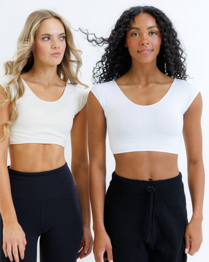 White Downeast Demi Tee displayed on a hanger, showing its soft fabric and casual fit, perfect for everyday wear.