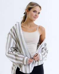 White Downeast Wonder Cami tee displayed on a model, showcasing its comfortable fit and simple design.
