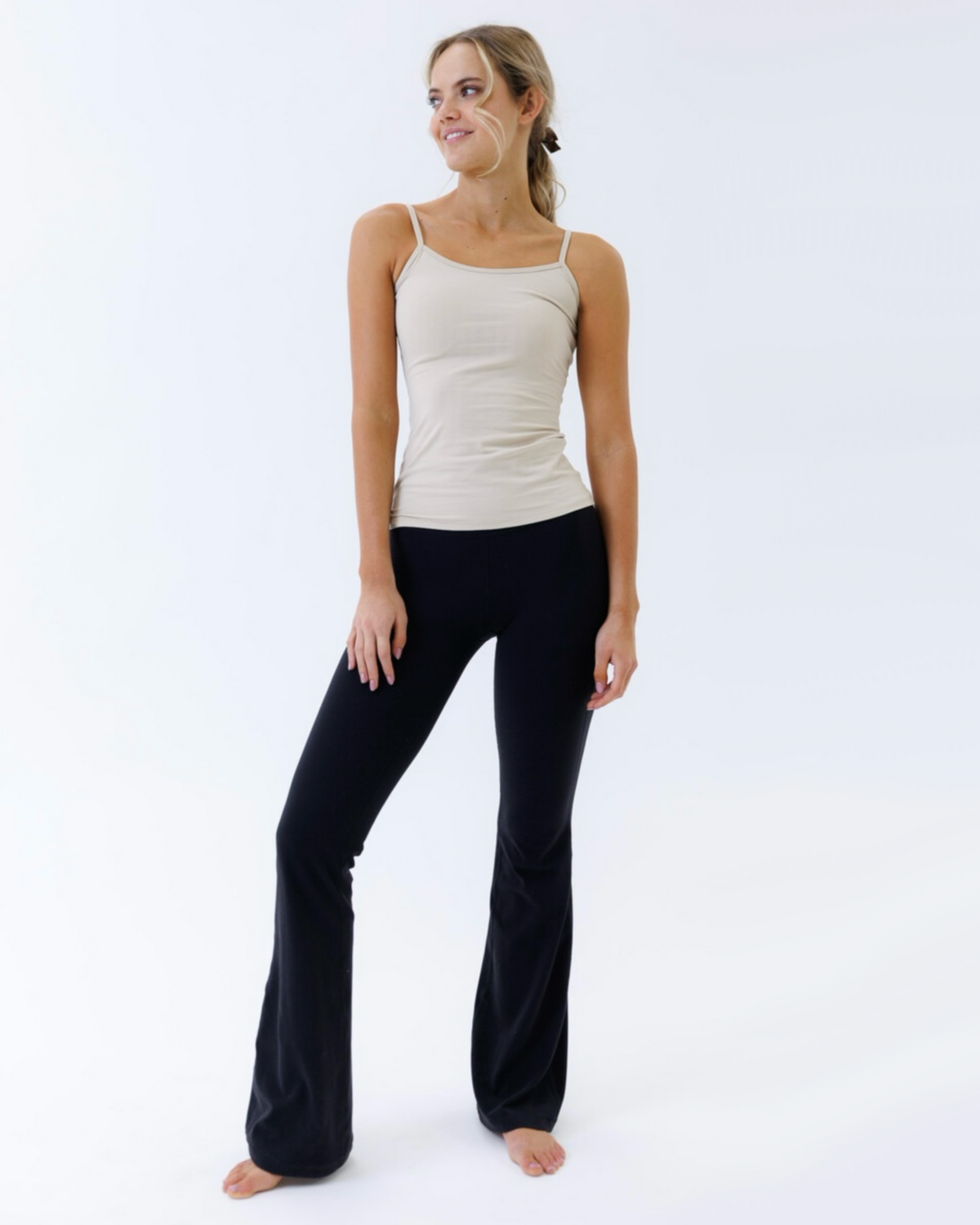 White Downeast Wonder Cami T-shirt displayed flat, showing its soft fabric and simple, comfortable design.