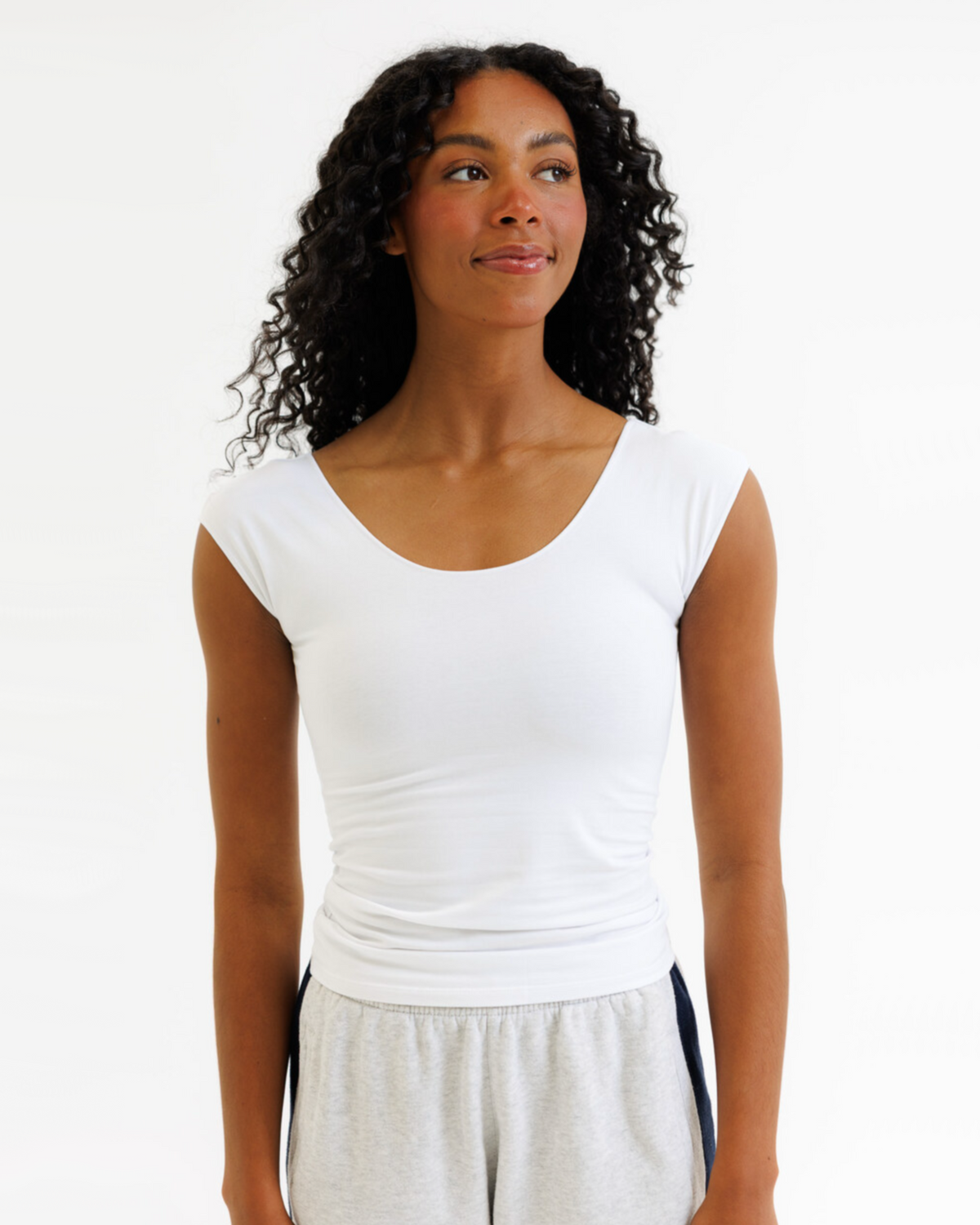 White Downeast Wonder Tee in size XS, soft cotton T-shirt with a classic fit, shown flat on a surface.