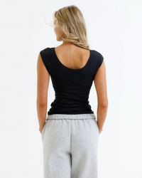 White Downeast Wonder Tee for women, featuring a classic fit and soft cotton fabric, shown laid flat.