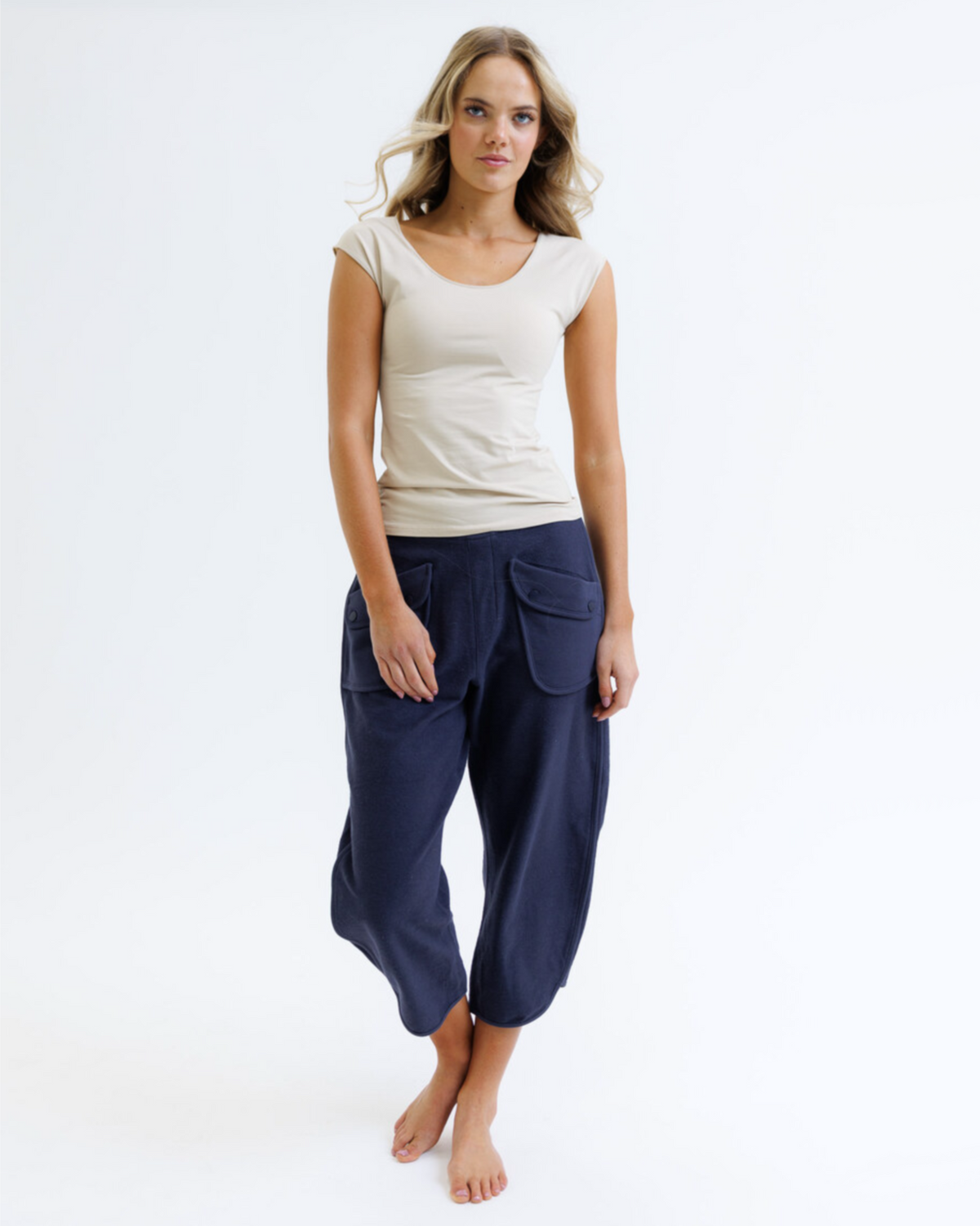 White Downeast Wonder Tee in size XS featuring a classic crew neck and soft cotton fabric, laid flat for display.