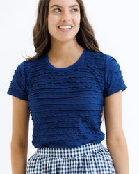 Light yellow Downeast scallop tee top with a rounded neckline and scalloped hem, casual and stylish for everyday wear.