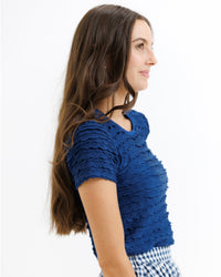 Downeast scallop tee in banana crepe fabric, shown in size XS with a scalloped neckline, casual women's top.